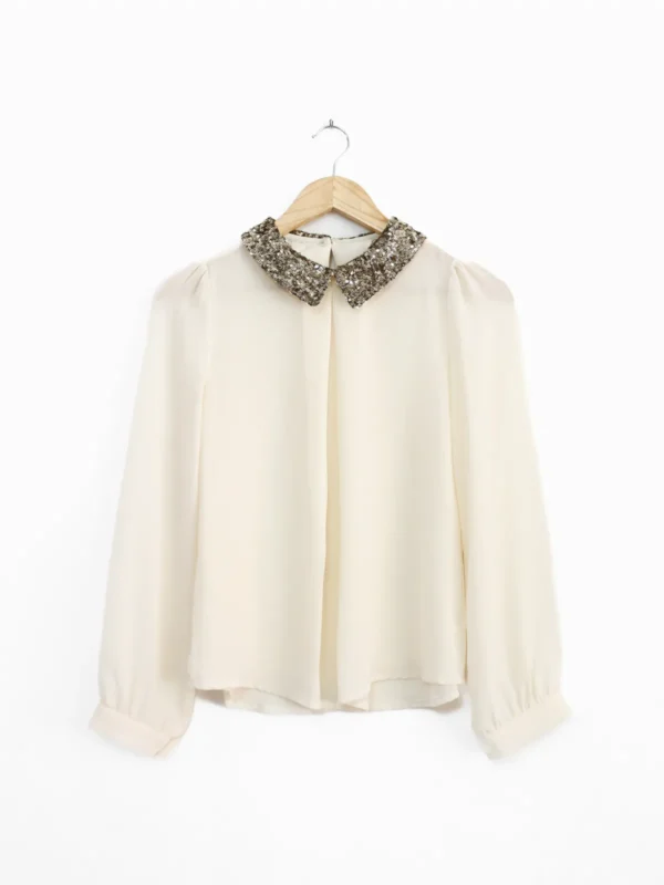Blusa crema Fiesta