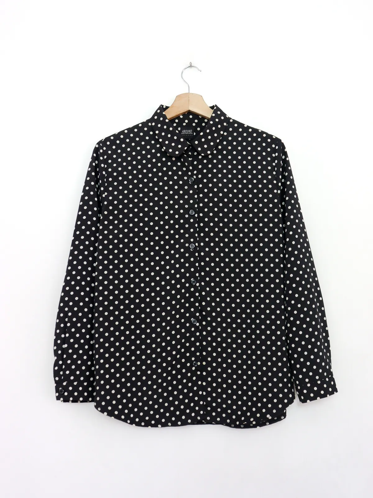 Blusa negra lunares